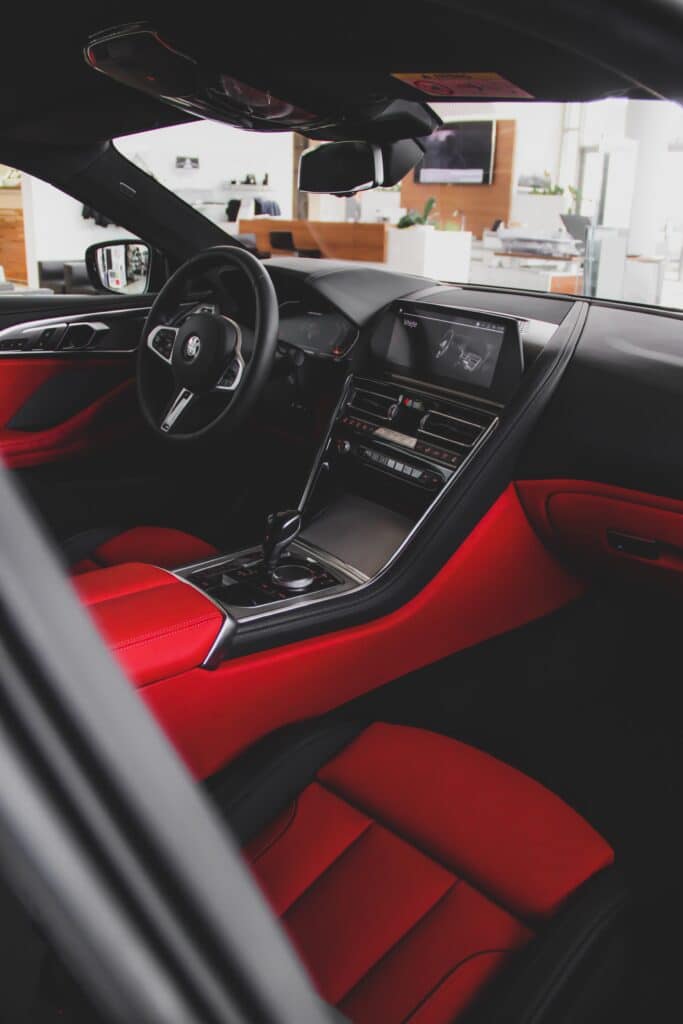 Luxurious BMW M8 interior featuring premium materials, advanced technology, and sporty design elements.